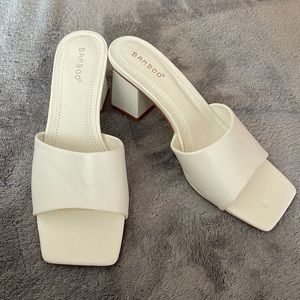 White slip on heels